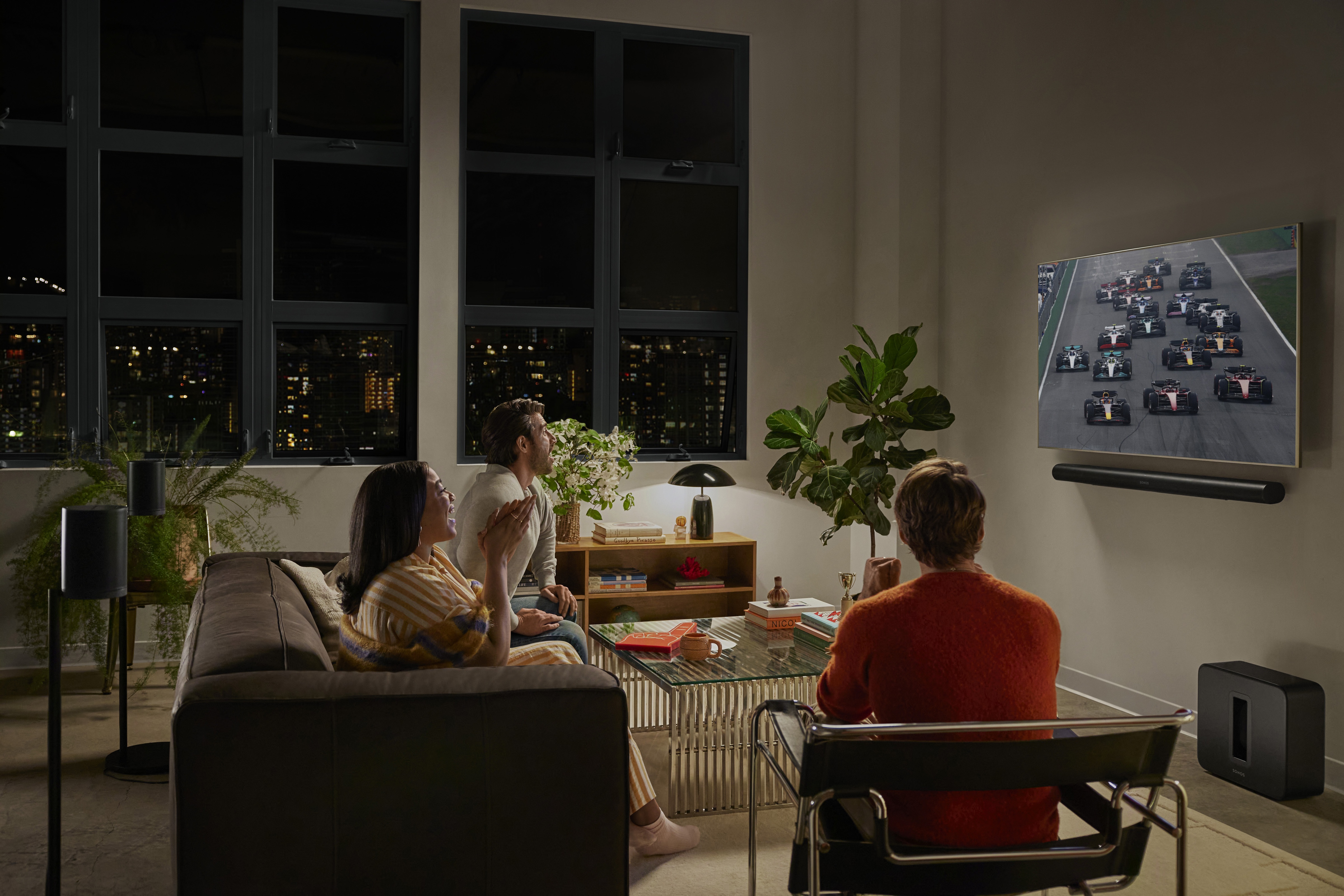 Compact loft room with Sonos speakers placed for balance