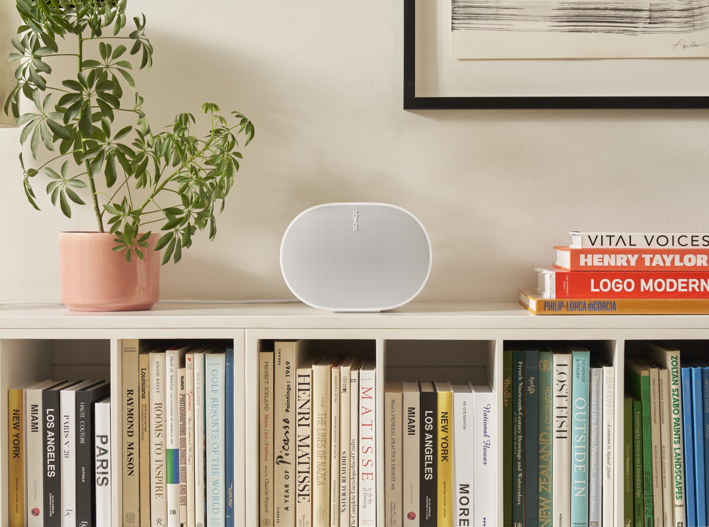 Sonos Era 300 placed high on a bookshelf for even coverage