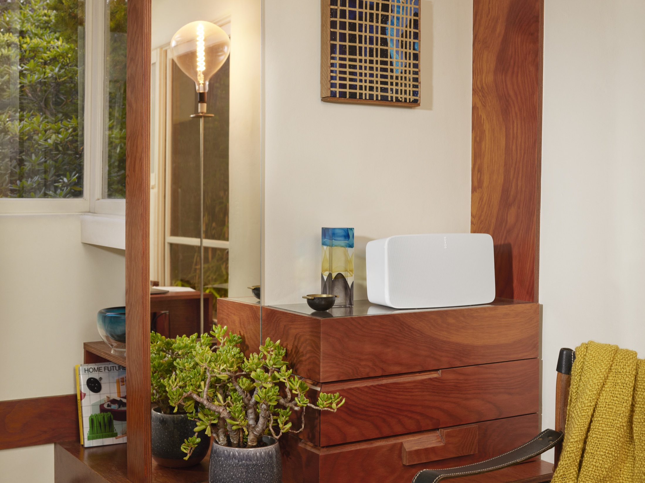 Bedroom with a Sonos speaker used for casual listening